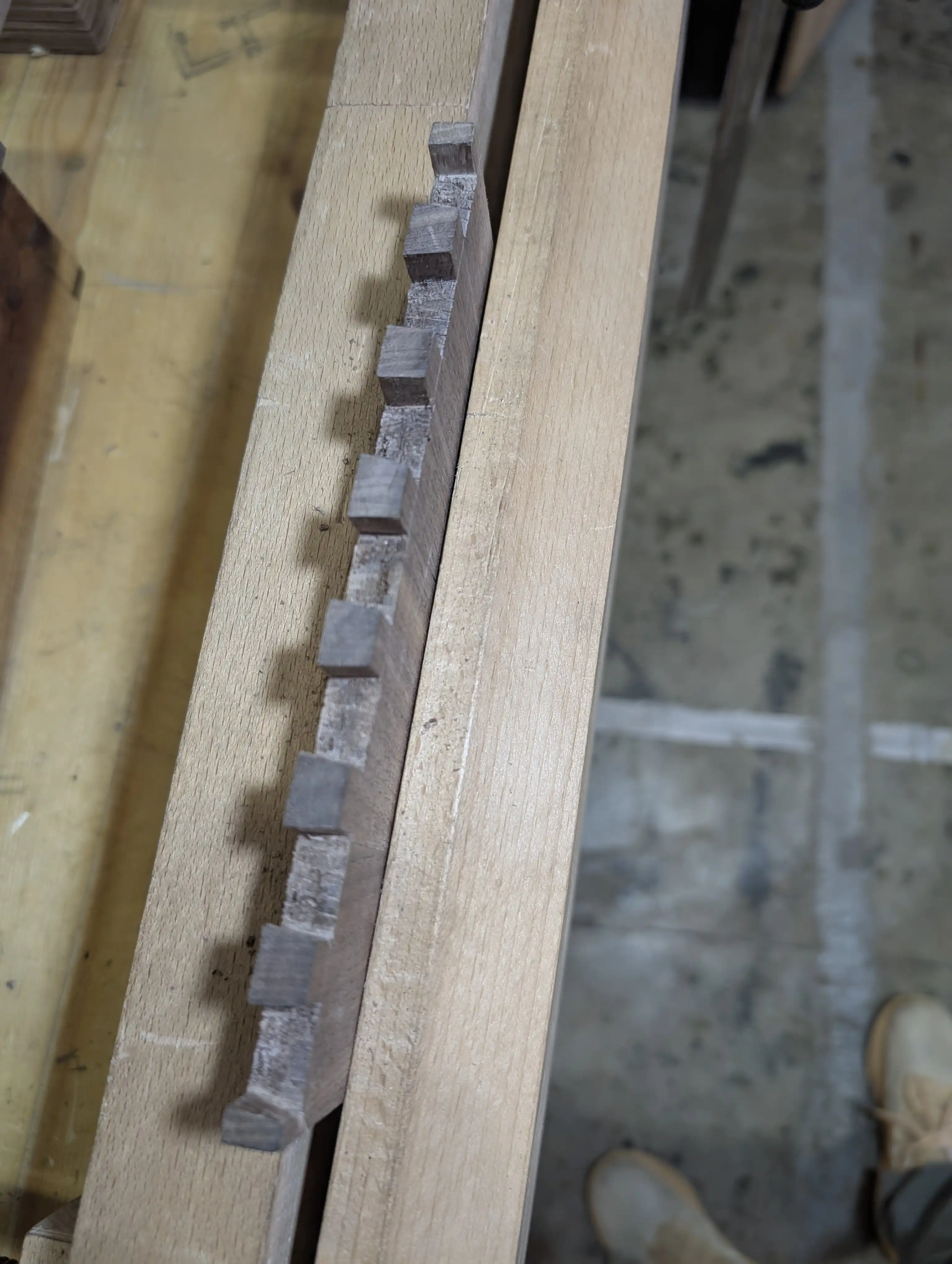 Fully cut and finished tails on a workbench.