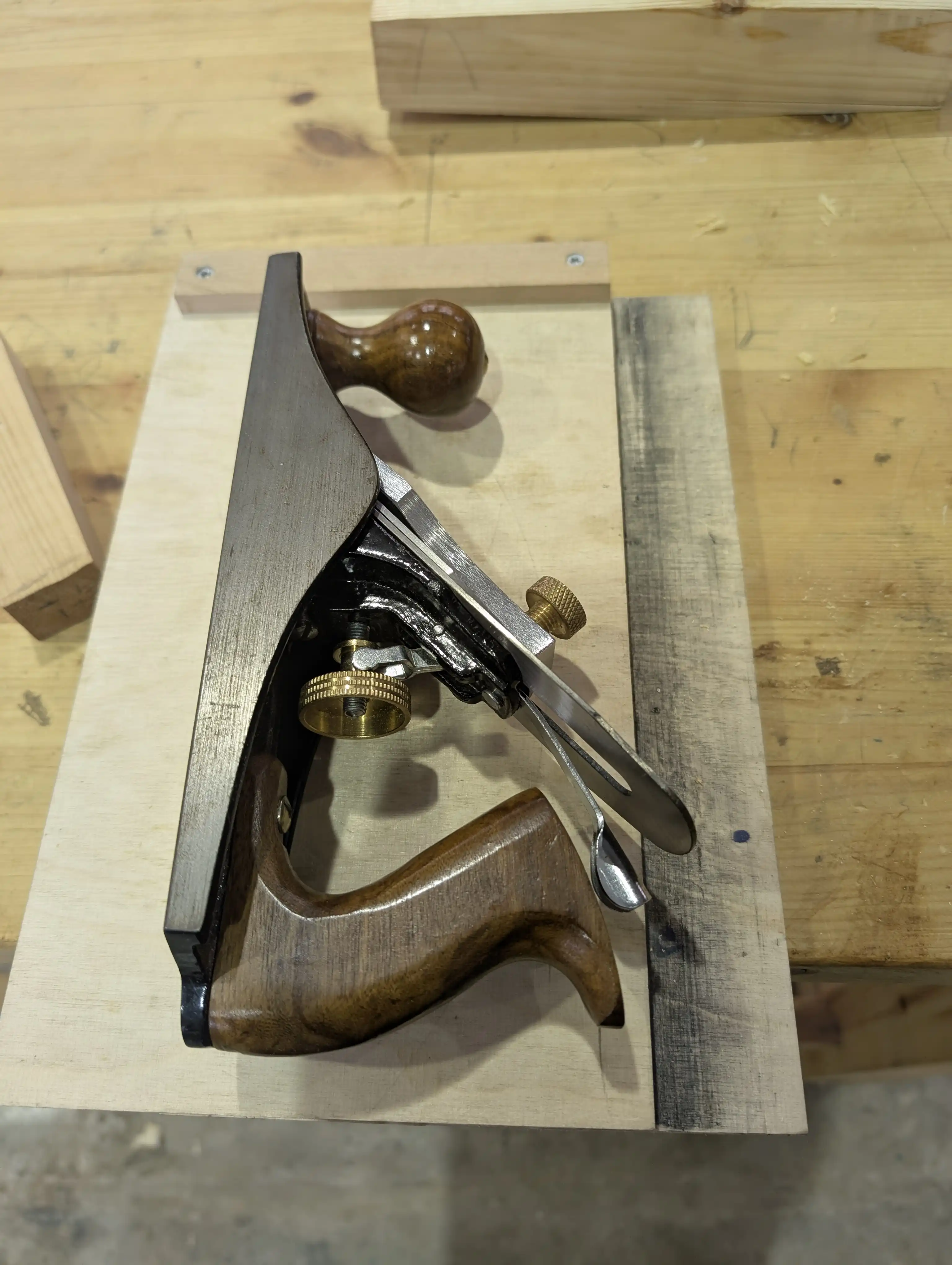A plane sitting on a shooting board.